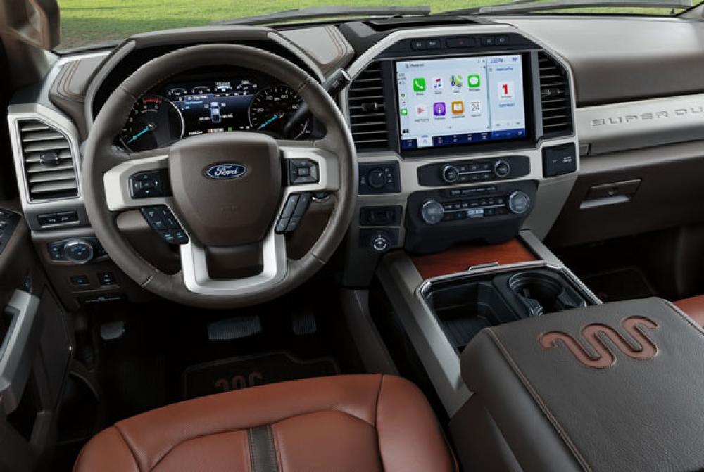 The interior dashboard of a Ford Super Duty truck