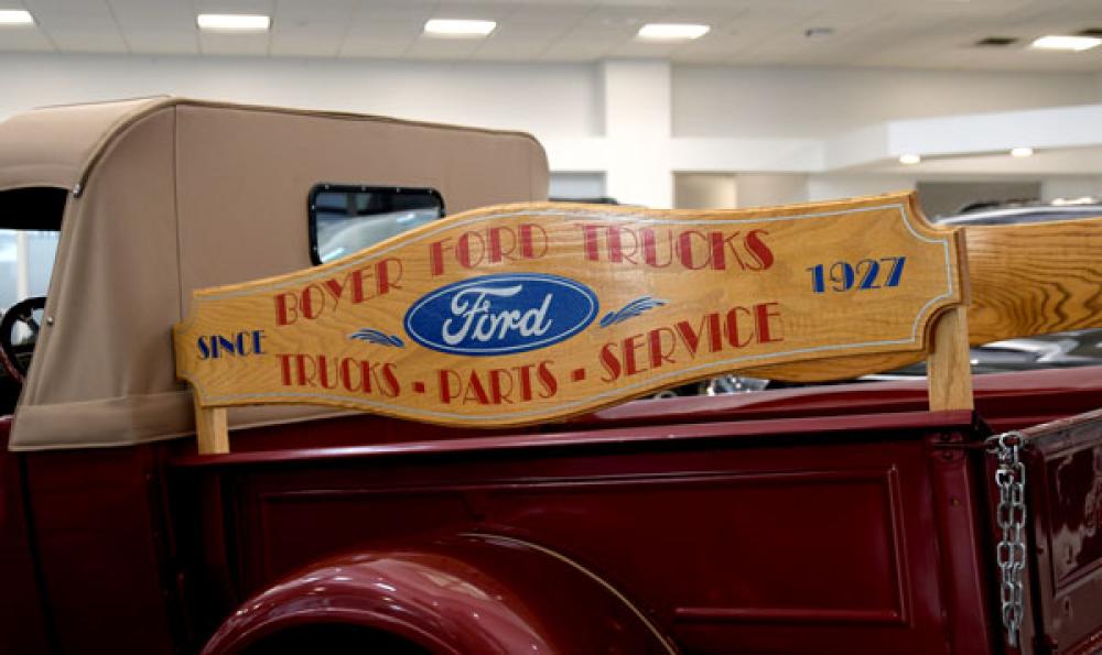A classic style truck with a Boyer Ford Trucks plaque